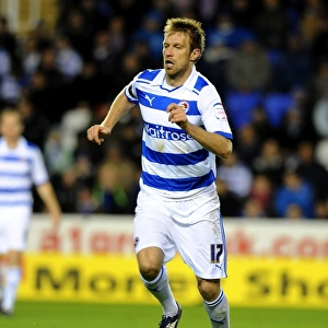 Intense Moment of Action: Kaspars Gorkss at Reading FC's Madejski Stadium during Npower Championship Match against Peterborough United