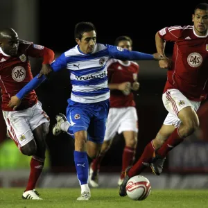 Intense Rivalry: Jem Karacan vs. Jamal Campbell-Ryce - A Battle in the Npower Championship between Reading and Bristol City at Ashton Gate