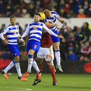 Intense Triangle Tussle: O'Grady vs. Norwood & McShane - Battle for Possession in Nottingham Forest vs. Reading (Sky Bet Championship)