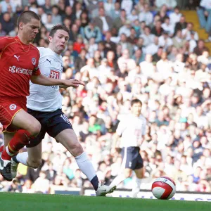 Ivar Ingimarsson battles with Robbie Keane for the ball