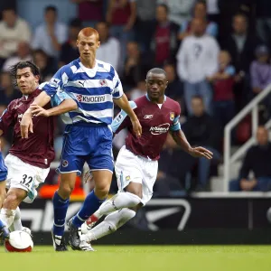 James Harper& Steve Sidwell battle with Carlos Tevez & Nigel Reo-Coker