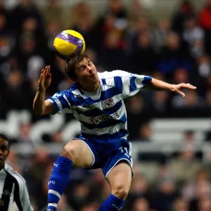 John Oster heads the ball