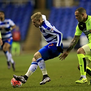 Matej Vydra vs. Joel Lynch: A Battle in the Emirates FA Cup Third Round Replay - Reading's Vydra Clashes with Huddersfield's Lynch at Madejski Stadium