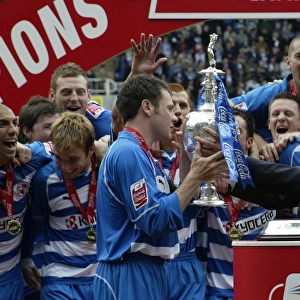 Murty Receives the Championship Trophy