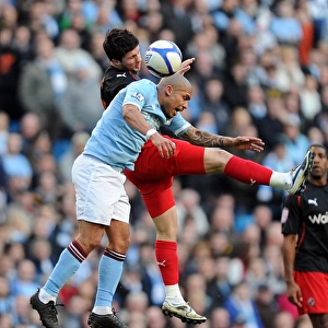 Nigel De Jong vs. Shane Long: FA Cup Sixth Round Showdown - Heading Battle at Manchester City Stadium
