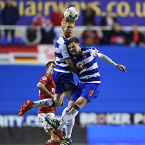 Norwood and McShane in Action: A Tight Battle for the Ball - Reading FC vs. Nottingham Forest (Sky Bet Championship, Madejski Stadium)