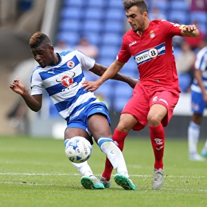 Reading FC: Aaron Tshibola Fights for Possession Against Espanyol