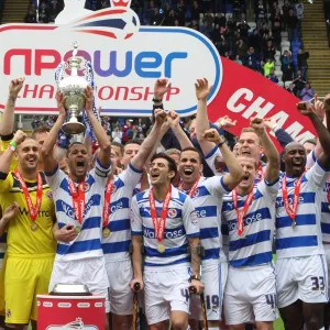 Reading FC: Celebrating Promotion to Championship with Trophy Lift at Madejski Stadium