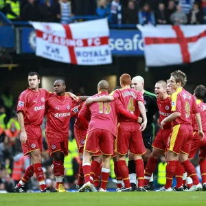 Reading players break from the huddle before the 2-2 draw against Chelsea at Stamford Bridge