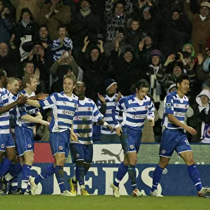 Reading players celebrate Kevin Doyles 68th minute goal to make it 6-0 against West Ham Utd