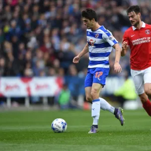 Reading's Lucas Piazon Outmaneuvers Charlton's Johnnie Jackson: A Moment of Skill at Madejski Stadium