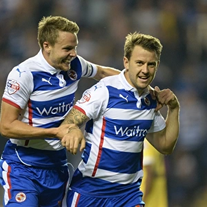 Reading's Simon Cox and Chris Gunter: A Jubilant Moment as They Celebrate First Goal Against Millwall in Sky Bet Championship