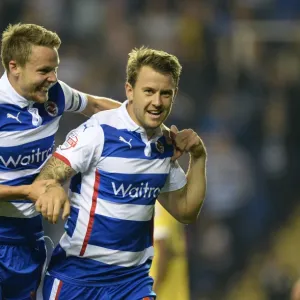 Reading's Simon Cox and Chris Gunter: A Jubilant Moment as They Celebrate First Goal Against Millwall in Sky Bet Championship