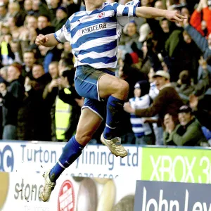 Shane Long leaps high to celebrate scoring his 44th minute goal against Sheffield Utd