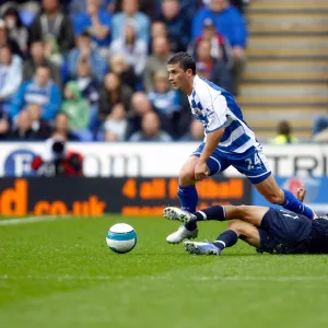 Shane Long rides a challenge from Steven Pienaar