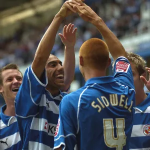 Steve and James celebrating a goal against Millwall