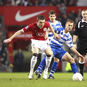 Steve Sidwell gets to grips with Michael Carrick