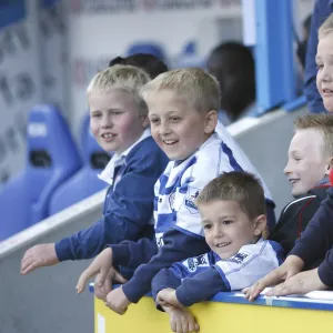 Young Royals fans play ball with Bobby Convey at the half time break against Watford