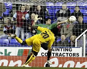 Images Dated 11th January 2007: Adam Federici makes a dramatic save from Ade Akinbiyi
