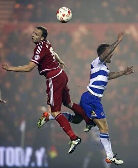 Images Dated 12th April 2016: Aerial Clash: Ritchie De Laet vs. Simon Cox in the Sky Bet Championship