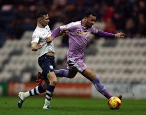 Images Dated 12th December 2015: Battle for the Ball: Browne vs. Robson-Kanu in Preston North End vs