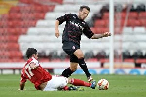 Adam Le Fondre Collection: Battle for the Ball: A Clash Between Greg Cunningham and Adam Le Fondre in the Pre-Season Friendly