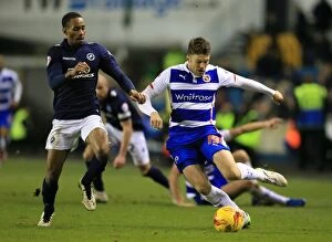 Millwall v Reading Collection: Battle for the Ball: Cowan-Hall vs. Mackie - Millwall vs. Reading Championship Clash