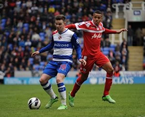 Images Dated 28th April 2013: Battle for the Ball: Guthrie vs. Jenas - Reading vs. Queens Park Rangers, Premier League Rivalry
