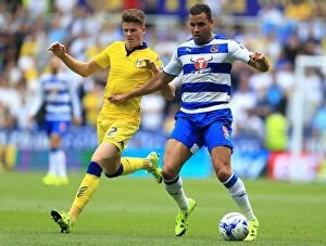 Images Dated 16th August 2015: Battle for the Ball: Hal Robson-Kanu vs. Sam Byram - Reading vs. Leeds United, Sky Bet Championship
