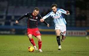 Images Dated 24th February 2015: Battle for the Ball: Huddersfield Town vs. Reading - Sky Bet Championship