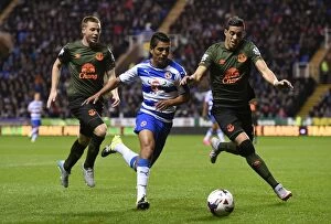 Capital One Cup - Third Round - Reading v Everton - Madejski Stadium Collection: Battle for the Ball: Hurtado, Funes Mori, and McCarthy's Intense Rivalry in the Capital One Cup