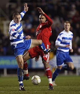 Images Dated 2nd January 2010: Battle for the Ball: Ingimarsson vs Ngog - Reading vs Liverpool's Intense FA Cup Clash