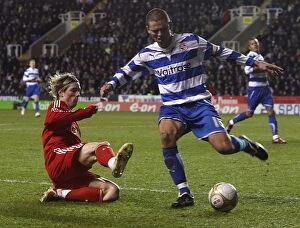 Images Dated 2nd January 2010: Battle for the Ball: Ivar Ingimarsson vs. Fernando Torres - Reading FC vs