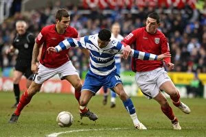 Images Dated 13th February 2010: Battle for the Ball: McAnuff vs. Dorrans and Mattock in Reading's FA Cup Fifth Round Clash