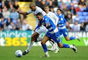 Images Dated 16th October 2010: Battle for the Ball: McAnuff vs. Pratley - Thrilling Championship Showdown between Reading