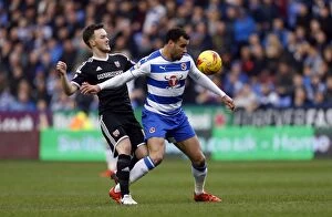 Images Dated 28th December 2015: Battle for the Ball: McEachran vs. Robson-Kanu - Reading vs. Brentford, Sky Bet Championship