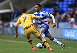 Images Dated 5th March 2016: Battle for the Ball: Obita vs. Fredericks in the Intense Sky Bet Championship Clash at Madejski
