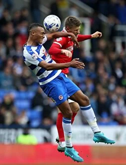 Reading v Charlton Athletic Collection: Battle for the Ball: Obita vs. Gudmundsson in the Intense Sky Bet Championship Clash between Reading