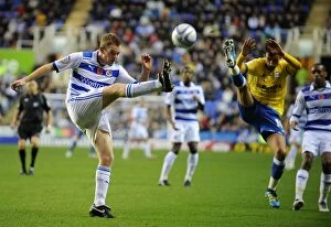 Images Dated 6th November 2011: Battle for the Ball: Pearce vs. Fahey in the Npower Championship Showdown - Reading vs