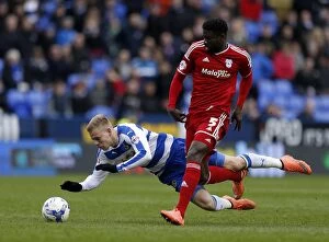 Images Dated 19th March 2016: Battle for the Ball: Pogrebnyak vs. Ecuele Manga - Reading vs. Cardiff City, Sky Bet Championship