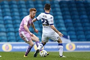 Images Dated 16th April 2016: Battle for the Ball: Quinn vs. Cook - Leeds United vs. Reading Championship Clash at Elland Road