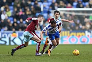 Reading v Burnley Collection: Battle for the Ball: Robson-Kanu vs. Jones - Intense Rivalry in the Sky Bet Championship