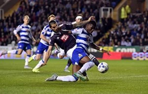 Images Dated 15th September 2015: Battle for the Ball: Tshibola vs. Johnson in the Intense Sky Bet Championship Clash at Reading's