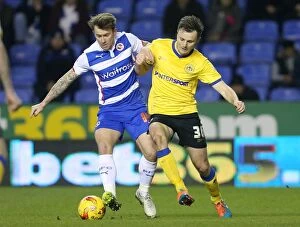 Images Dated 17th February 2015: Battle at Madejski Stadium: A Clash Between Simon Cox and William Kvist