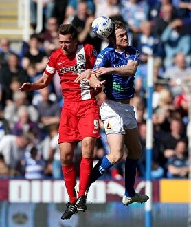 Images Dated 11th April 2015: Battle at Madejski Stadium: Pearce vs. Brown - A Riveting Encounter Between Reading's Alex Pearce