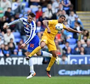 Images Dated 30th April 2016: Battle for Supremacy: Cooper vs. Beckford in the Sky Bet Championship Clash at Madejski Stadium