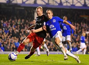 Images Dated 4th March 2011: Battleground Goodison Park: Osman vs. Gunnarsson - FA Cup Fifth Round Clash