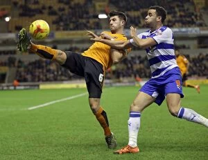 Images Dated 26th December 2015: Battling for Supremacy: A Championship Showdown - Batth vs. Robson-Kanu at Molineux