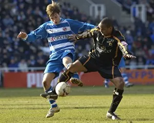 Images Dated 18th March 2006: Bobby Convey challenges Paul Ince for the ball