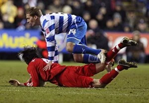 Images Dated 2nd January 2010: Brian Howard Fouls Alberto Aquilani: A Moment from the FA Cup Third Round Clash Between Reading